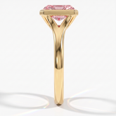 Fancy Vivid Pink radiant lab-grown diamond bezel ring in 14K (585) yellow gold, side profile 