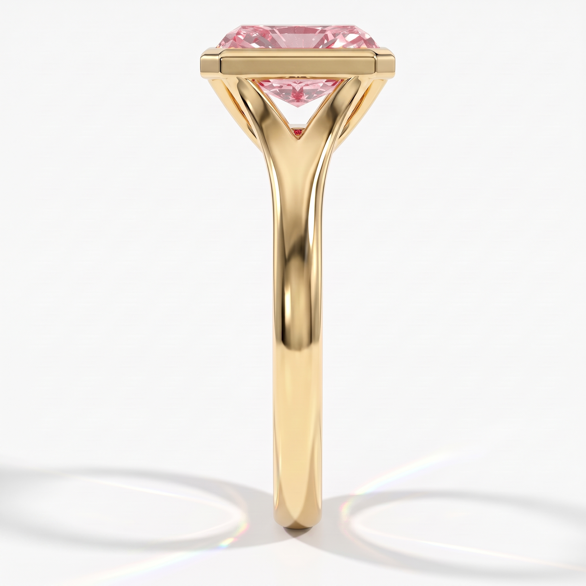 Fancy Vivid Pink radiant lab-grown diamond bezel ring in 14K (585) yellow gold, side profile 