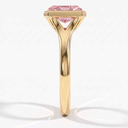 Fancy Vivid Pink radiant lab-grown diamond bezel ring in 18K (750) yellow gold, side profile 