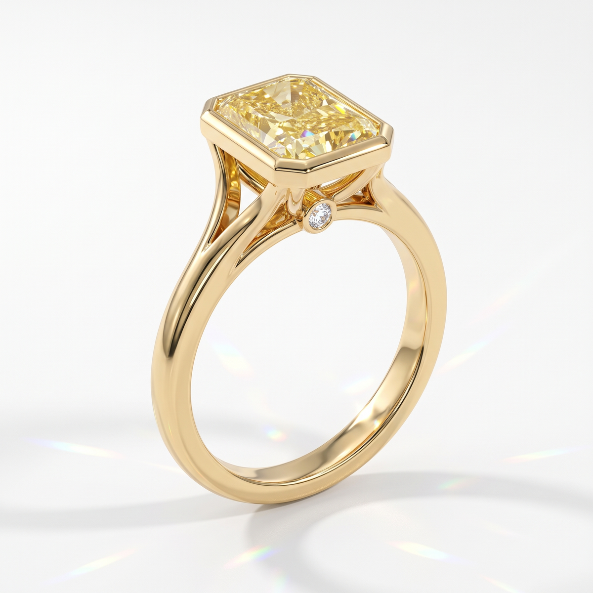Fancy Vivid Yellow radiant lab-grown diamond bezel ring in 14K (585) yellow gold, angled view 