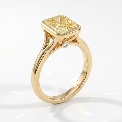 Fancy Vivid Yellow radiant lab-grown diamond bezel ring in 18K (750) yellow gold, angled view 