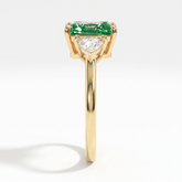 Fancy Vivid Green radiant lab-grown diamond three-stone ring with trillion side diamonds in 14K (585) yellow gold, side profile 