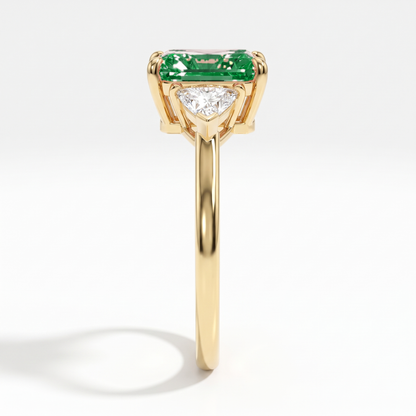 Fancy Vivid Green radiant lab-grown diamond three-stone ring with trillion side diamonds in 14K (585) yellow gold, side profile 