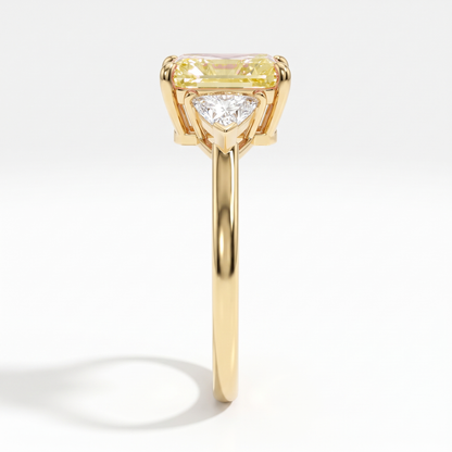 Fancy Vivid Yellow radiant lab-grown diamond three-stone ring with trillion side diamonds in 14K (585) yellow gold, side profile 