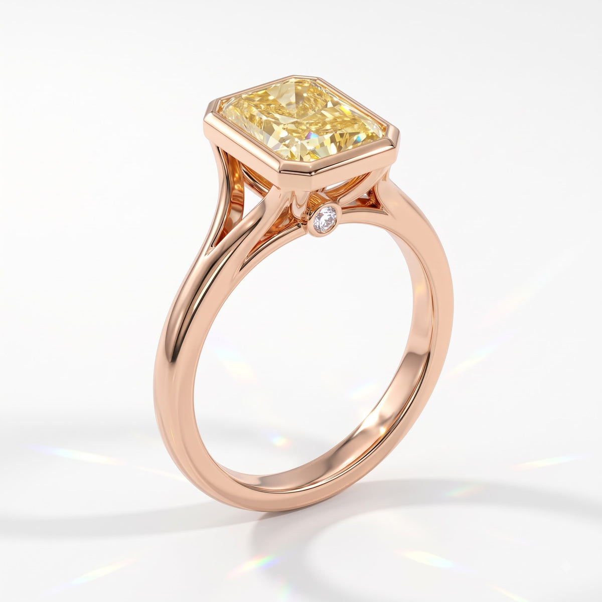 Fancy Vivid Yellow radiant lab-grown diamond bezel ring in 14K (585) rose gold, angled view 