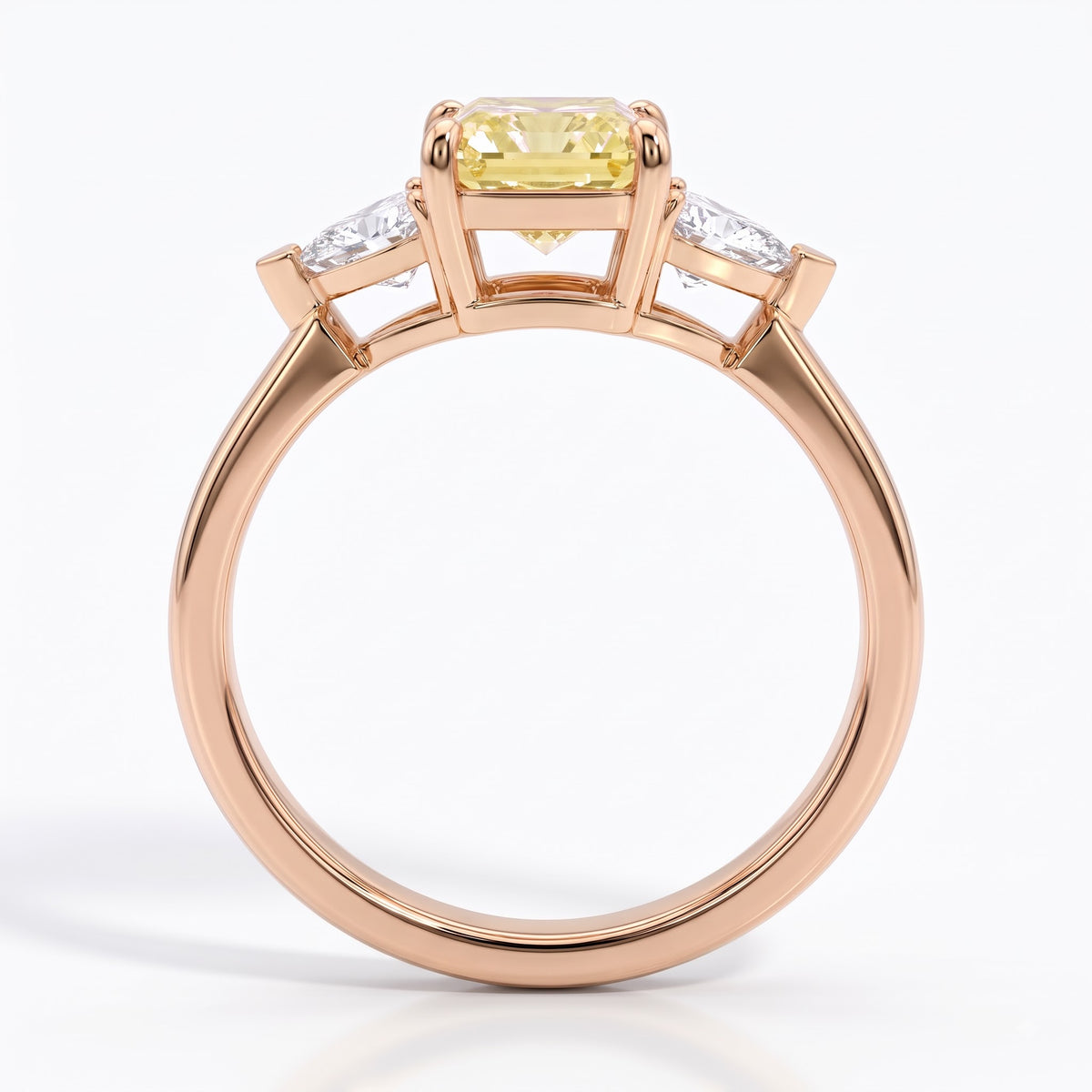 Fancy Vivid Yellow radiant lab-grown diamond three-stone ring with trillion side diamonds in 14K (585) rose gold, front view 