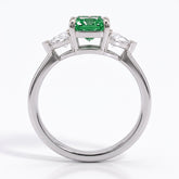 Fancy Vivid Green radiant lab-grown diamond three-stone ring with trillion side diamonds in 18K (750) white gold, front view 