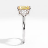 Fancy Vivid Yellow radiant lab-grown diamond three-stone ring with trillion side diamonds in 14K (585) white gold, side profile 