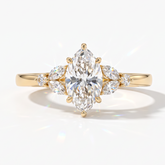Marquise cut lab-grown diamond leaf cluster engagement ring with marquise and round accents in 14K (585) yellow gold, front view 