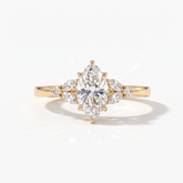 Marquise cut lab-grown diamond leaf cluster engagement ring with marquise and round accents in 18K (750) yellow gold, front view 