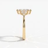 Marquise cut lab-grown diamond leaf cluster engagement ring with marquise and round accents in 14K (585) yellow gold, side view 