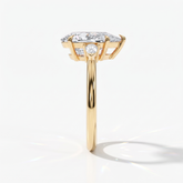 Pear cut lab-grown diamond three-stone engagement ring with pear side stones in 14K (585) yellow gold, side view 