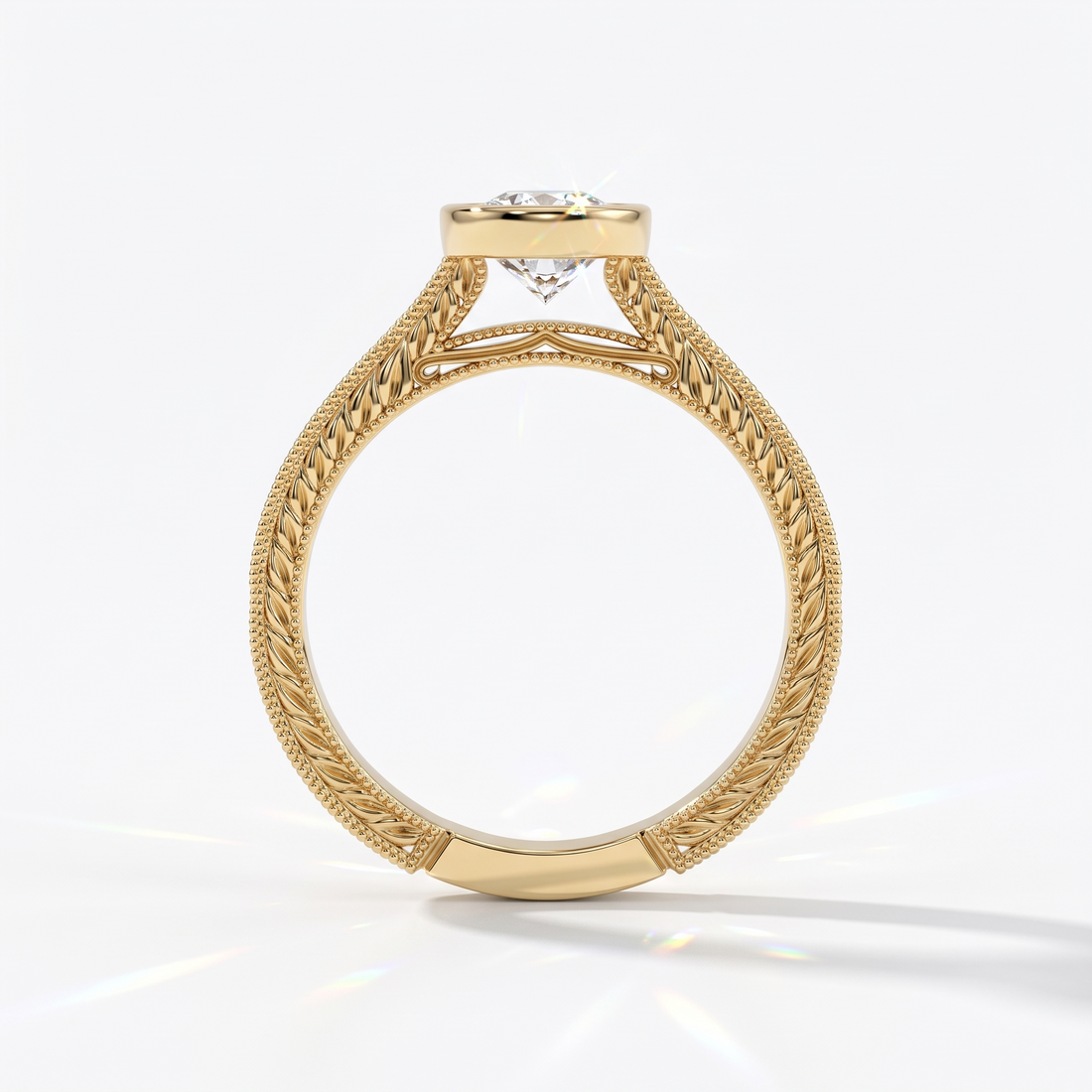 Pear cut lab-grown diamond vintage bezel engagement ring with hand-engraved milgrain band in 14K (585) yellow gold, upright profile view 