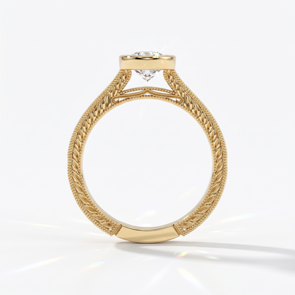 Pear cut lab-grown diamond vintage bezel engagement ring with hand-engraved milgrain band in 14K (585) yellow gold, upright profile view 