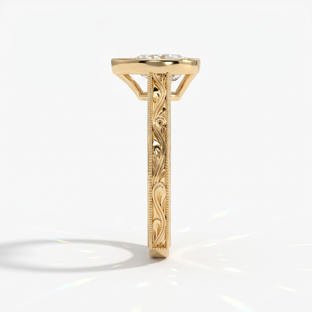 Pear cut lab-grown diamond vintage bezel engagement ring with hand-engraved milgrain band in 14K (585) yellow gold, side view 