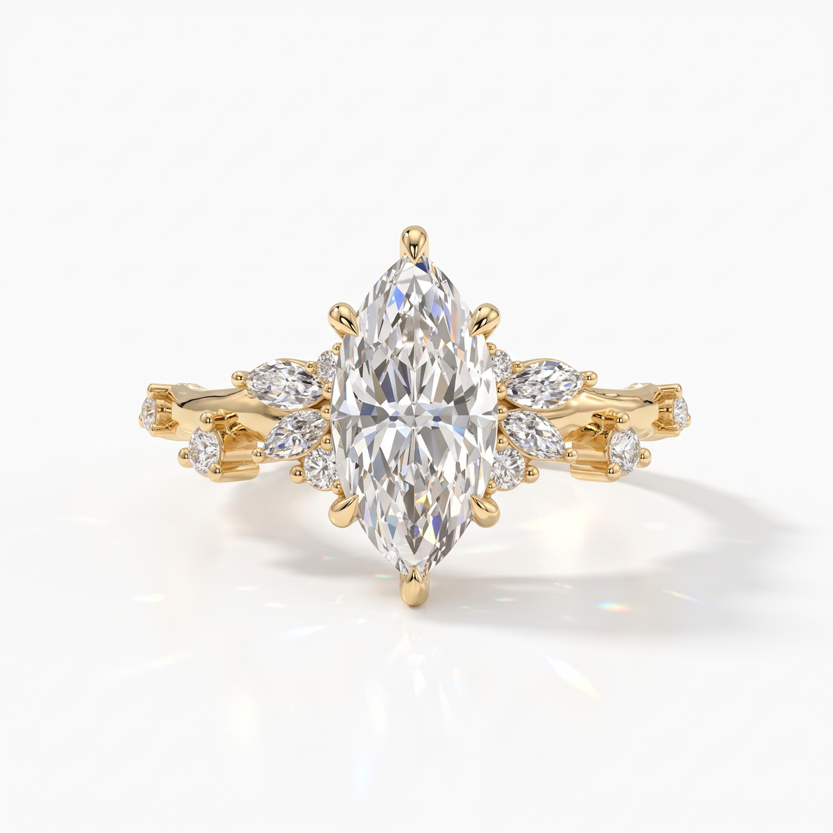 Marquise cut lab-grown diamond cluster engagement ring with marquise and round leaf accents in 14K (585) yellow gold, front view 
