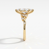 Marquise cut lab-grown diamond cluster engagement ring with marquise and round leaf accents in 14K (585) yellow gold, side view 