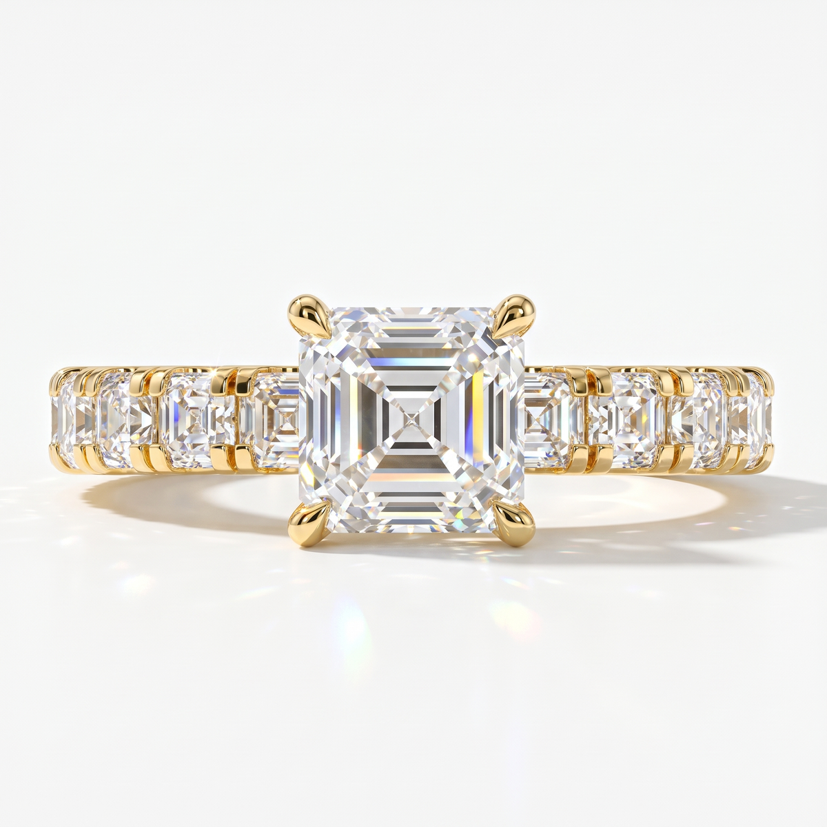 Asscher cut lab-grown diamond engagement ring with Asscher side stones in 14K (585) yellow gold, front view 