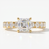 Asscher cut lab-grown diamond engagement ring with Asscher side stones in 14K (585) yellow gold, front view 