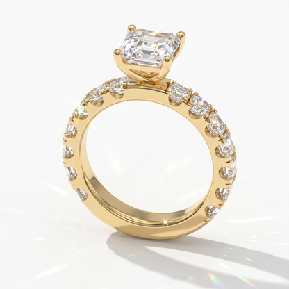 Asscher cut lab-grown diamond engagement ring with Asscher side stones in 14K (585) yellow gold, angled view 