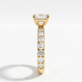 Asscher cut lab-grown diamond engagement ring with Asscher side stones in 14K (585) yellow gold, side view 