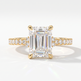 Emerald cut lab-grown diamond hidden halo collar engagement ring with pavé band in 14K (585) yellow gold, front view 