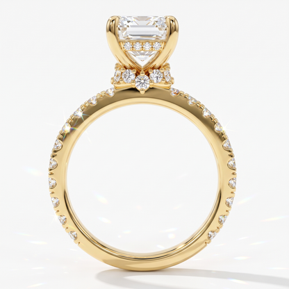 Emerald cut lab-grown diamond hidden halo collar engagement ring with pavé band in 14K (585) yellow gold, upright profile view 