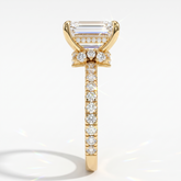 Emerald cut lab-grown diamond hidden halo collar engagement ring with pavé band in 18K (750) yellow gold, side view 
