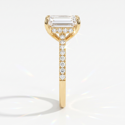 Emerald cut lab-grown diamond hidden halo engagement ring with pavé band in 14K (585) yellow gold, side view 