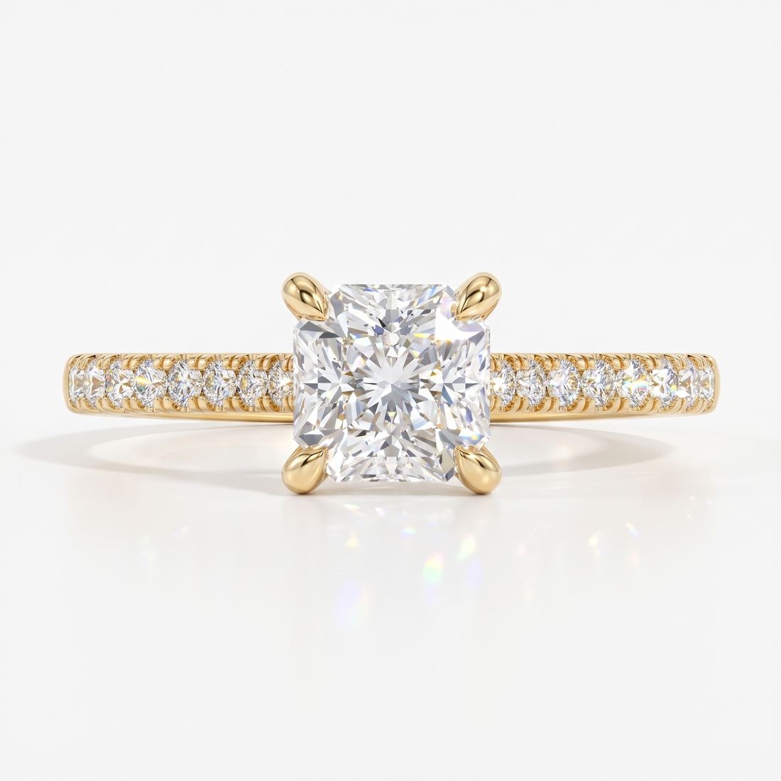 Square radiant cut lab-grown diamond engagement ring with pavé side stones in 14K (585) yellow gold, front view 