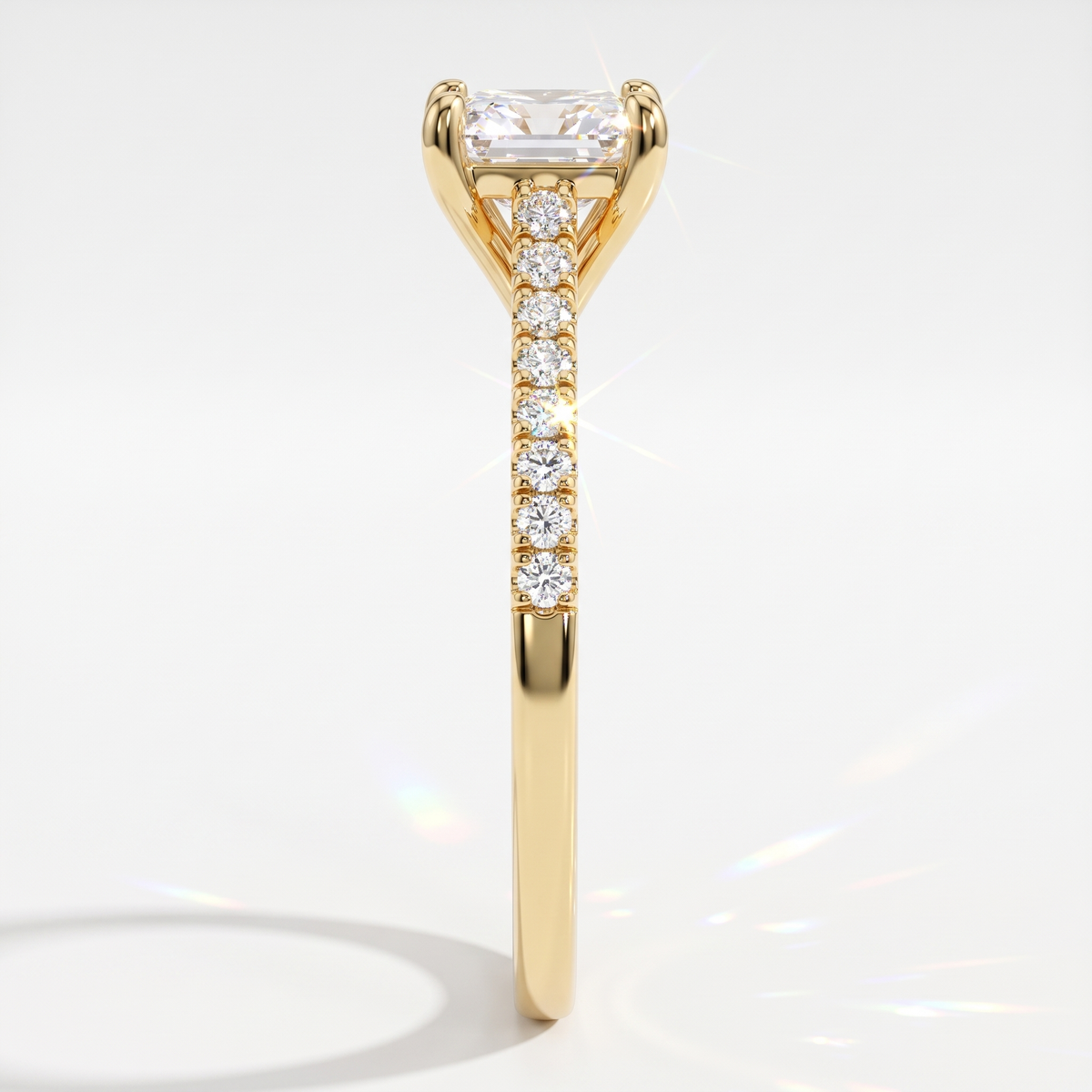 Square radiant cut lab-grown diamond engagement ring with pavé side stones in 14K (585) yellow gold, side view 