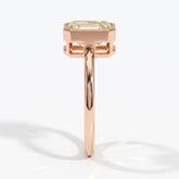 Fancy Intense Yellow emerald cut lab-grown diamond bezel ring in 18K (750) rose gold, side profile 