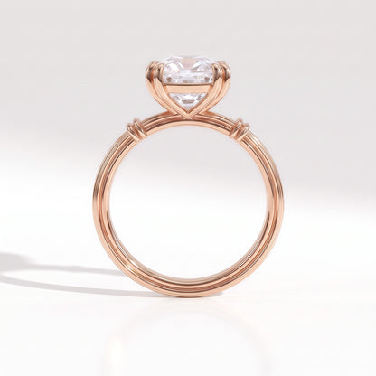 Old mine cushion lab-grown diamond vintage solitaire engagement ring with fluted band in 14K (585) rose gold, profile view showing the double-claw basket 