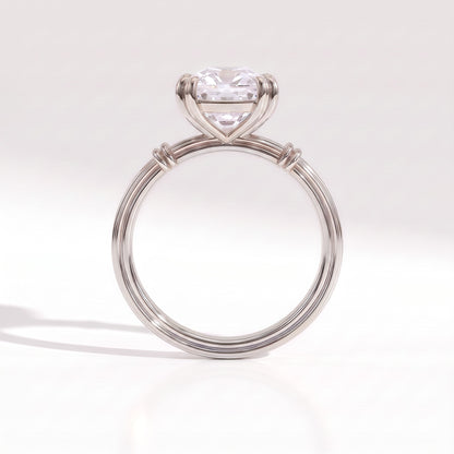 Old mine cushion lab-grown diamond vintage solitaire engagement ring with fluted band in 18K (750) white gold, profile view showing the double-claw basket 