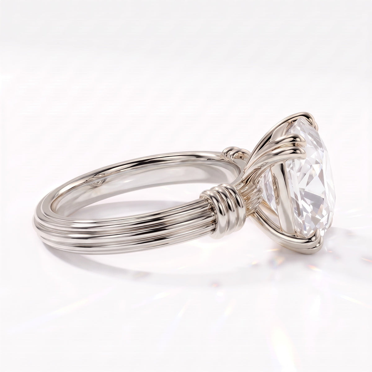 Old mine cushion lab-grown diamond vintage solitaire engagement ring with fluted band in 950 platinum, side view showing the fluted band and wrapped shoulders 