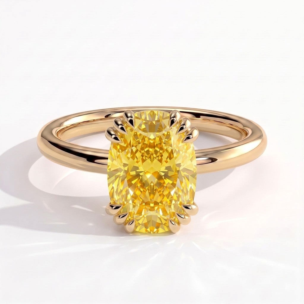 Fancy Vivid Yellow elongated cushion lab-grown diamond solitaire engagement ring with triple claw prongs in 14K (585) yellow gold, front view 