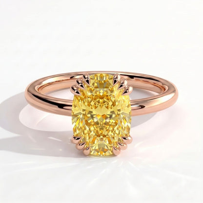 Fancy Vivid Yellow elongated cushion lab-grown diamond solitaire engagement ring with triple claw prongs in 18K (750) rose gold, front view 