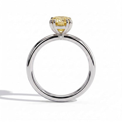 Fancy Vivid Yellow elongated cushion lab-grown diamond solitaire engagement ring with triple claw prongs in 18K (750) white gold, side profile 