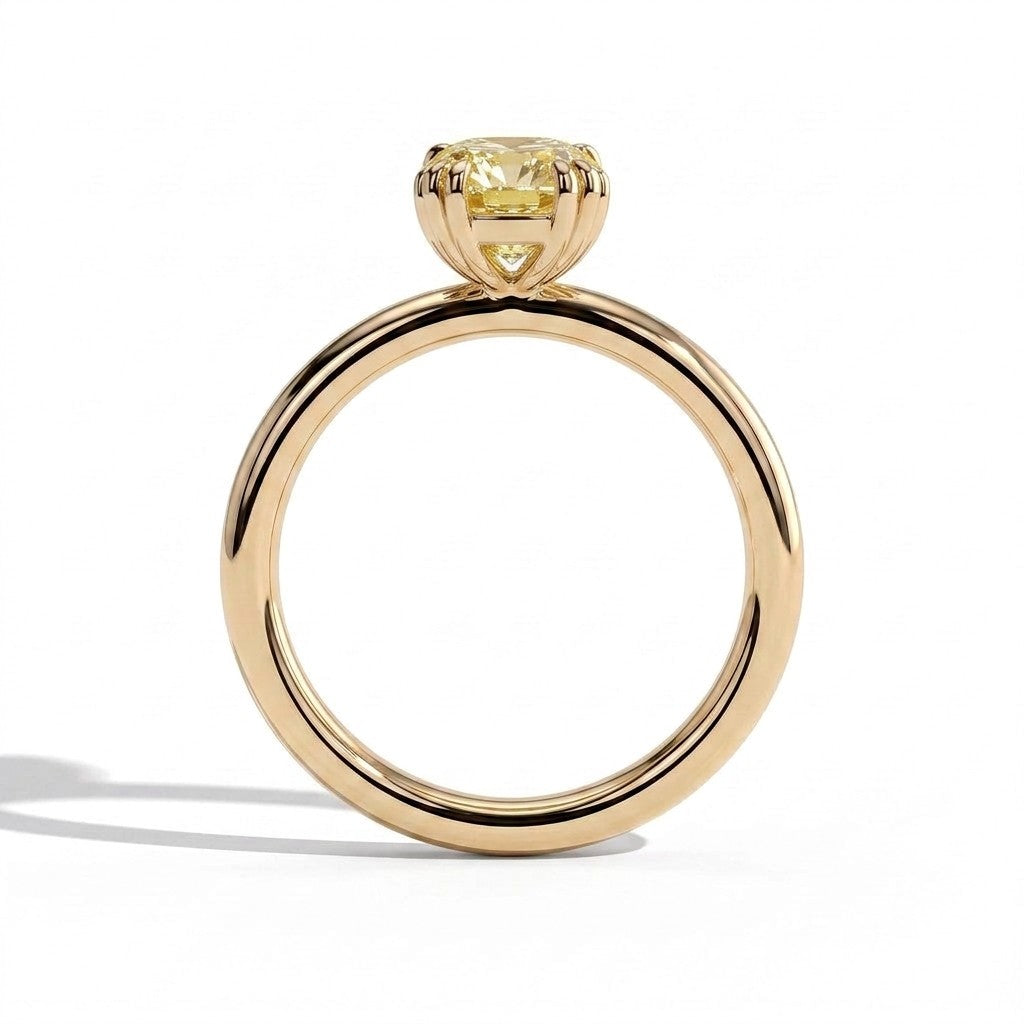 Fancy Vivid Yellow elongated cushion lab-grown diamond solitaire engagement ring with triple claw prongs in 18K (750) yellow gold, side profile 