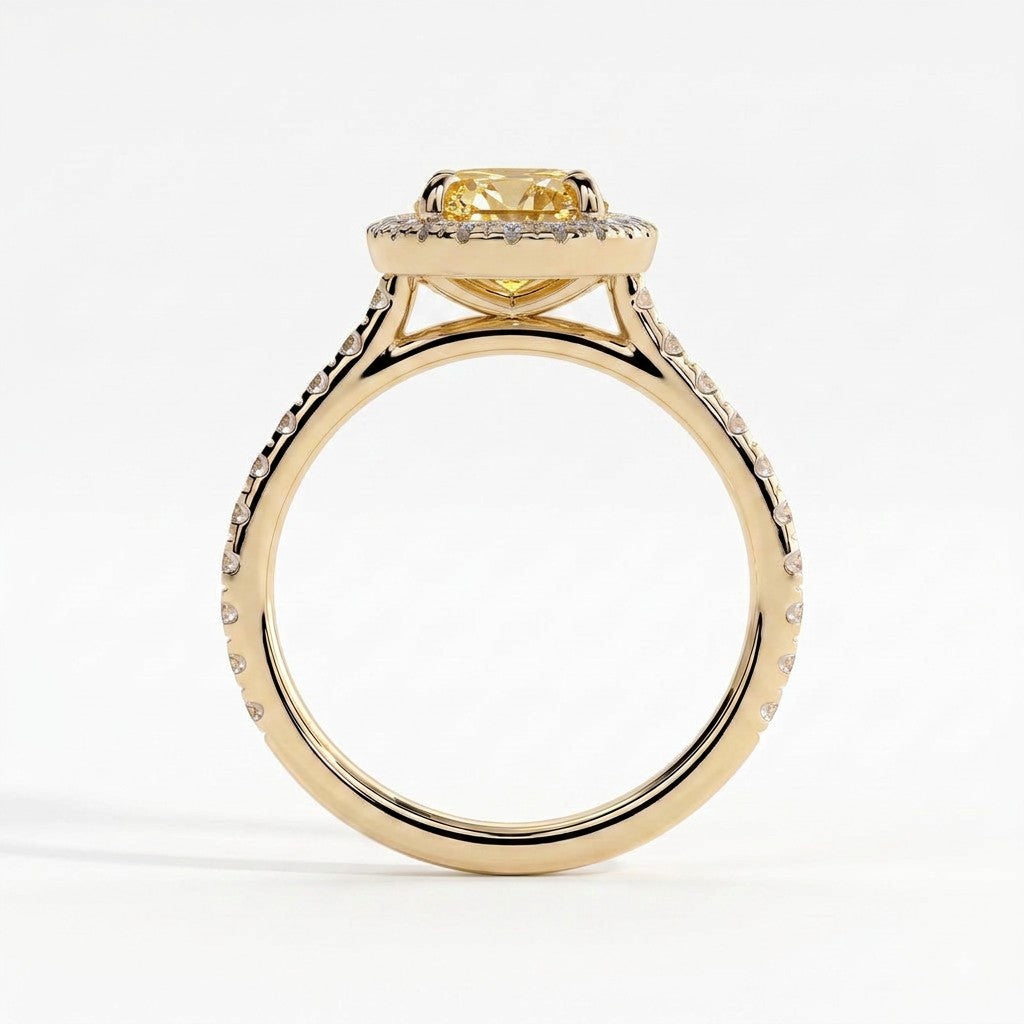 Fancy Vivid Yellow oval lab-grown diamond halo engagement ring with cathedral pavé band in 14K (585) yellow gold, side profile showing the cathedral setting 