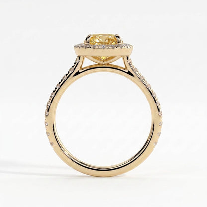 Fancy Vivid Yellow oval lab-grown diamond halo engagement ring with cathedral pavé band in 14K (585) yellow gold, side profile showing the cathedral setting 