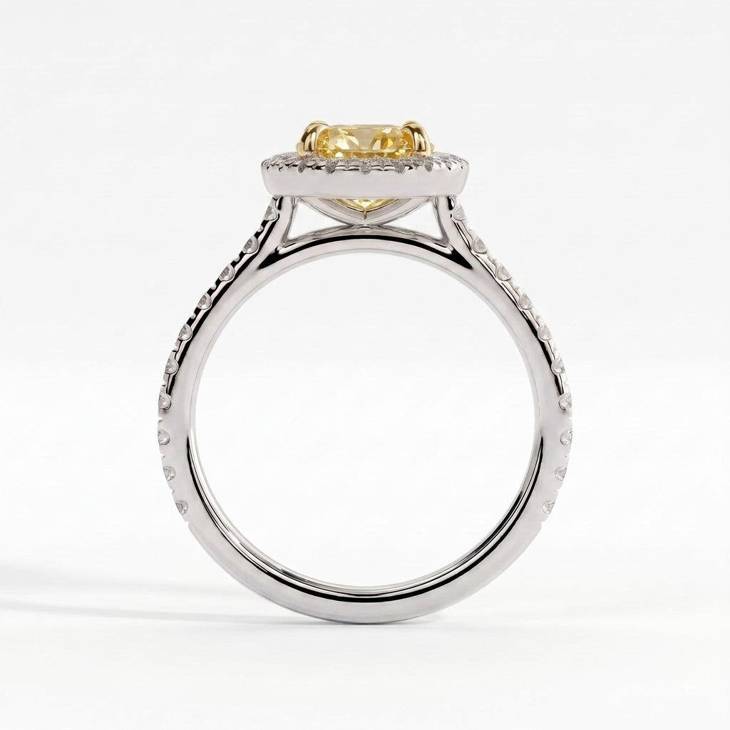 Fancy Vivid Yellow oval lab-grown diamond halo engagement ring with cathedral pavé band in 18K (750) white gold, side profile showing the cathedral setting 