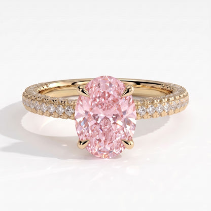 Fancy Vivid Pink oval lab-grown diamond engagement ring with triple pavé band and hidden halo in 14K (585) yellow gold, front view 