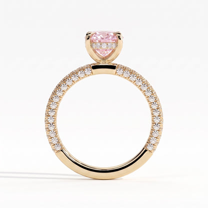 Fancy Vivid Pink oval lab-grown diamond engagement ring with triple pavé band and hidden halo in 18K (750) yellow gold, side profile showing the hidden halo 