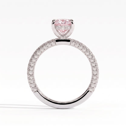 Fancy Vivid Pink oval lab-grown diamond engagement ring with triple pavé band and hidden halo in 950 platinum, side profile showing the hidden halo 