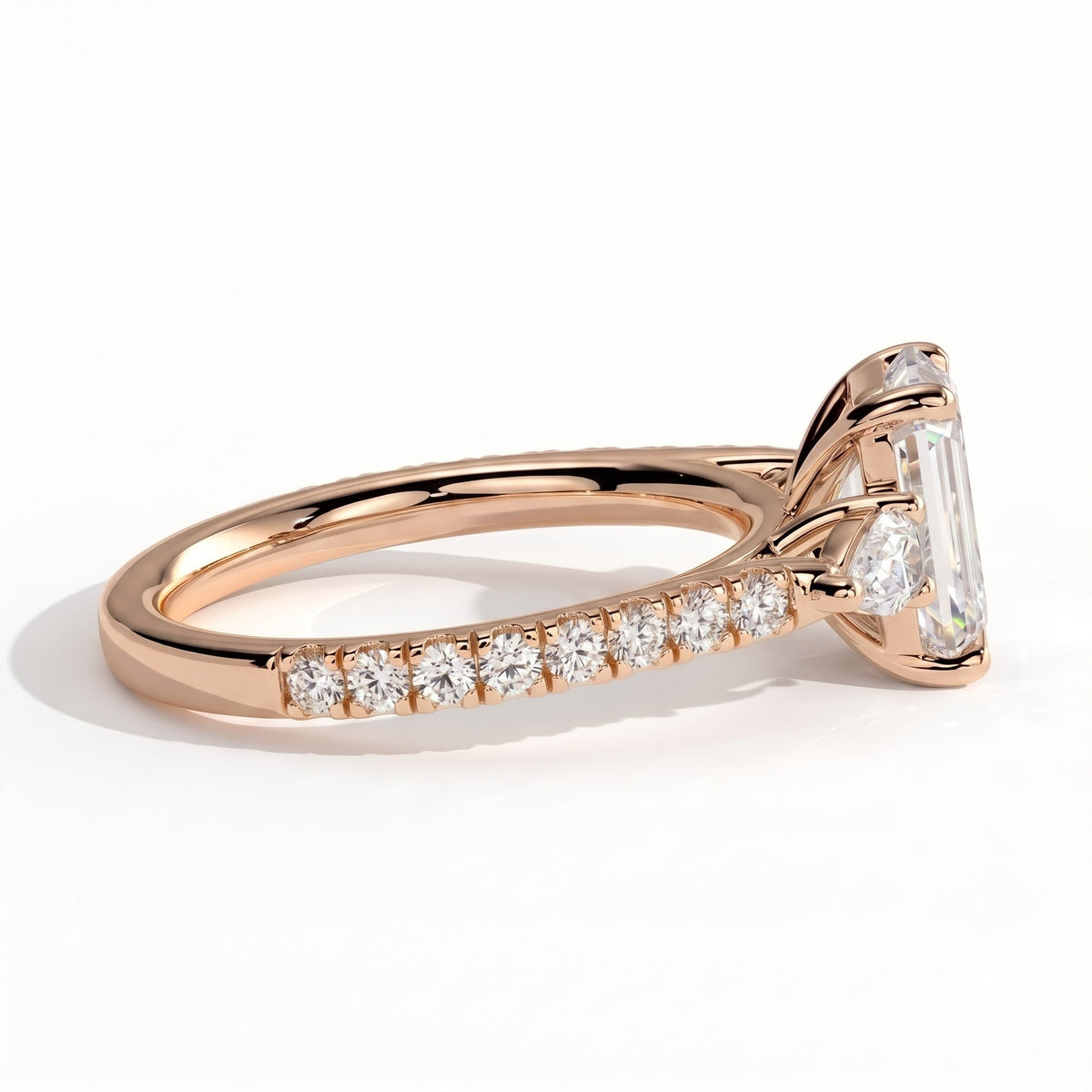 Emerald lab-grown diamond three-stone engagement ring in 18K (750) rose gold, detail view 