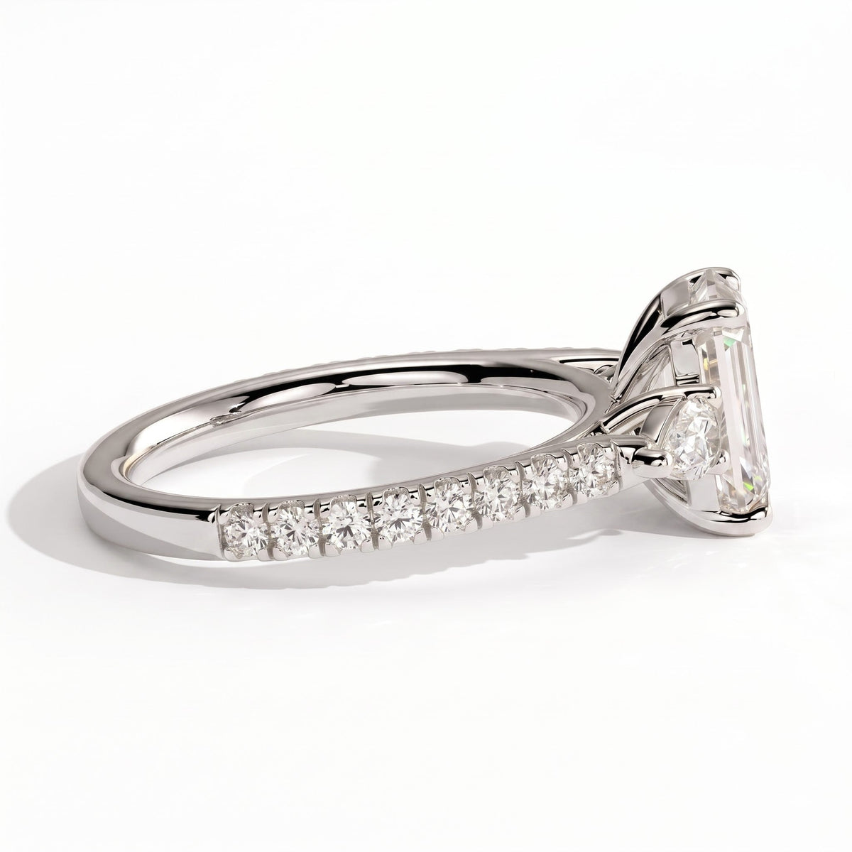 Emerald lab-grown diamond three-stone engagement ring in 950 platinum, detail view 