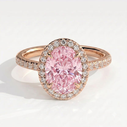 Fancy Vivid Pink oval lab-grown diamond halo engagement ring with cathedral pavé band in 14K (585) rose gold, front view 