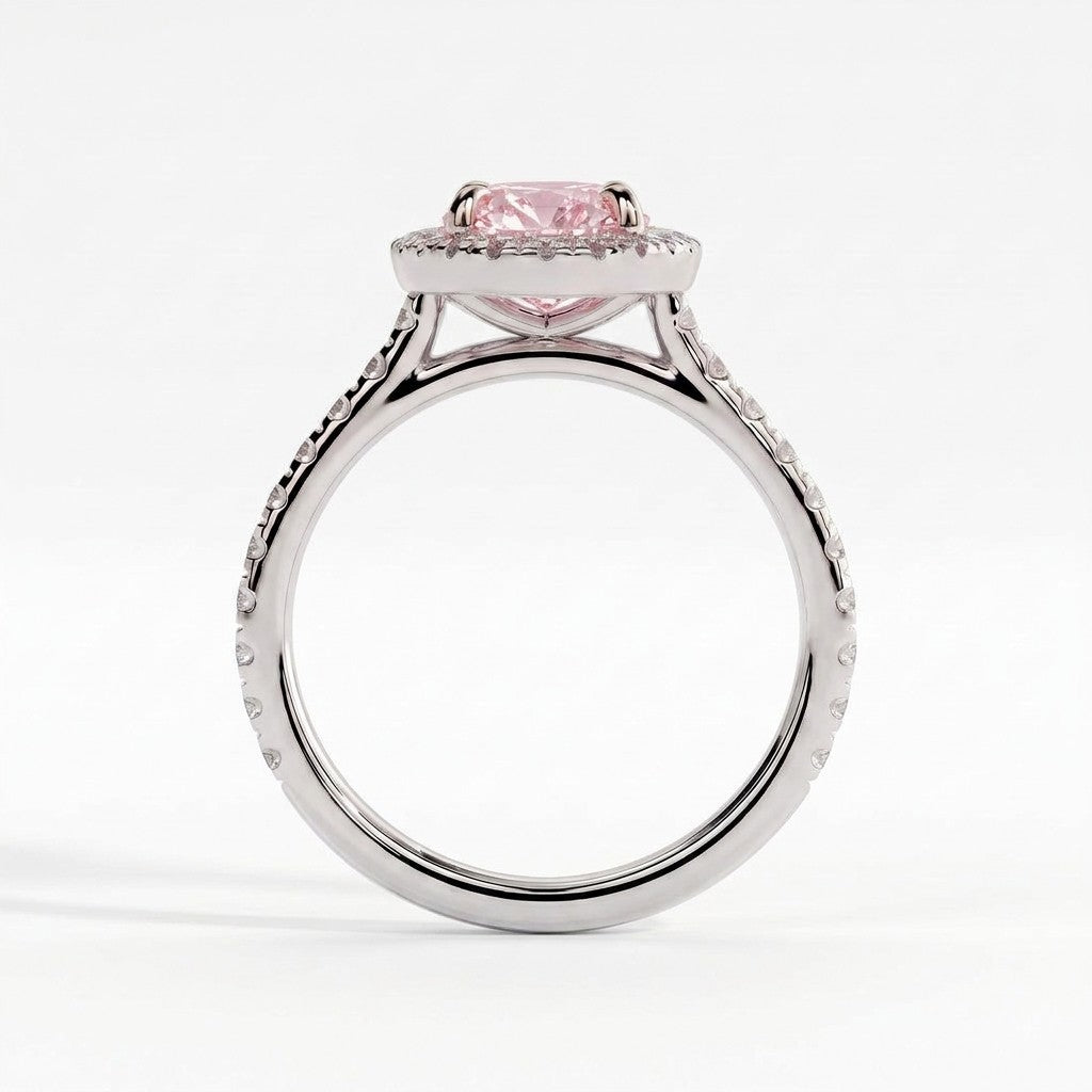 Fancy Vivid Pink oval lab-grown diamond halo engagement ring with cathedral pavé band in 14K (585) white gold, side profile showing the cathedral setting 