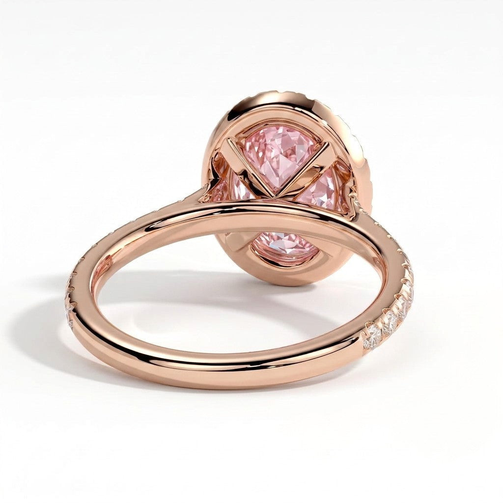 Fancy Vivid Pink oval lab-grown diamond halo engagement ring with cathedral pavé band in 18K (750) rose gold, on white background 